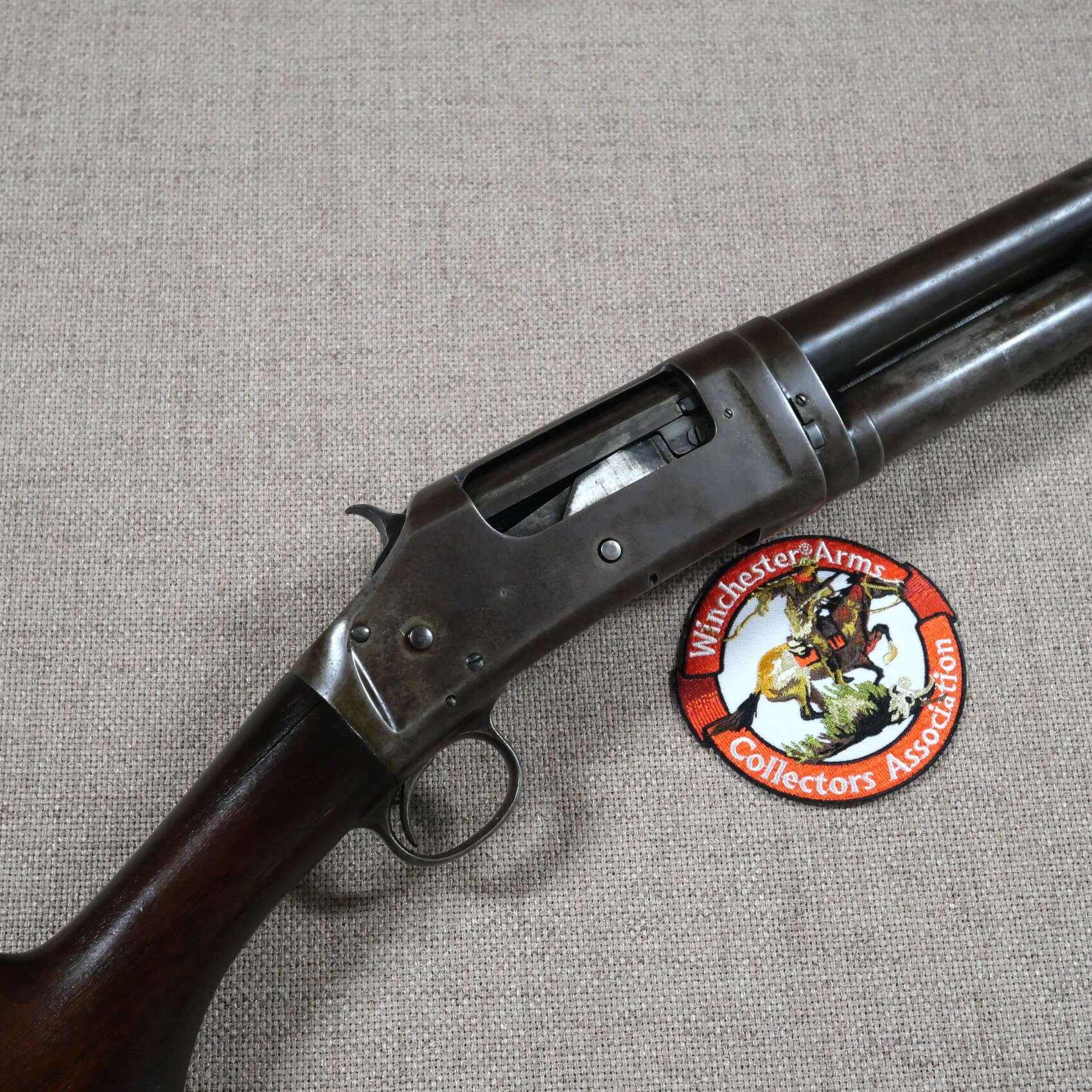 Fusil à pompe Winchester Model 1897 Takedown canon miroir cal 12 court 26’’